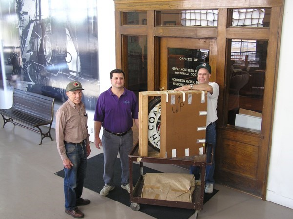 A small part of this magnificent Shannon collection: 20+ framed builders photos, NCL drumhead, Mainstreeter station sign, snow plow No. 46's head light, photos, diagram books, collection of NP Gas Electric builder photos covering construction. 