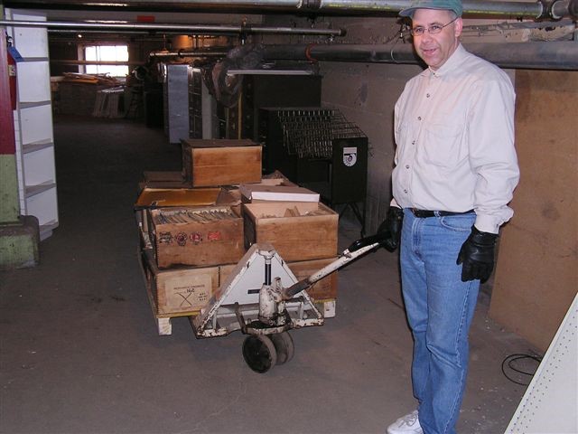 Jim Dick takes the first load out to the new storage area.